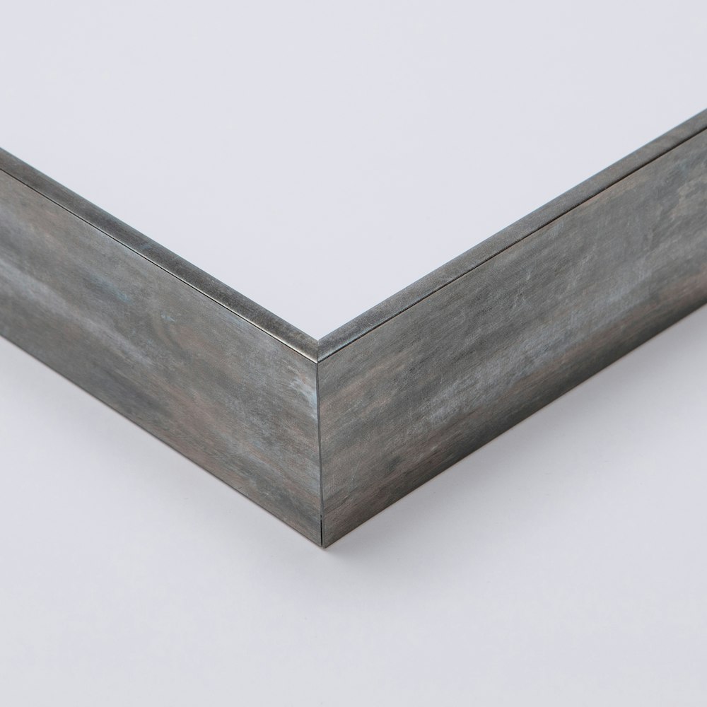 Float Frame moulding aged metallic gray corner detail