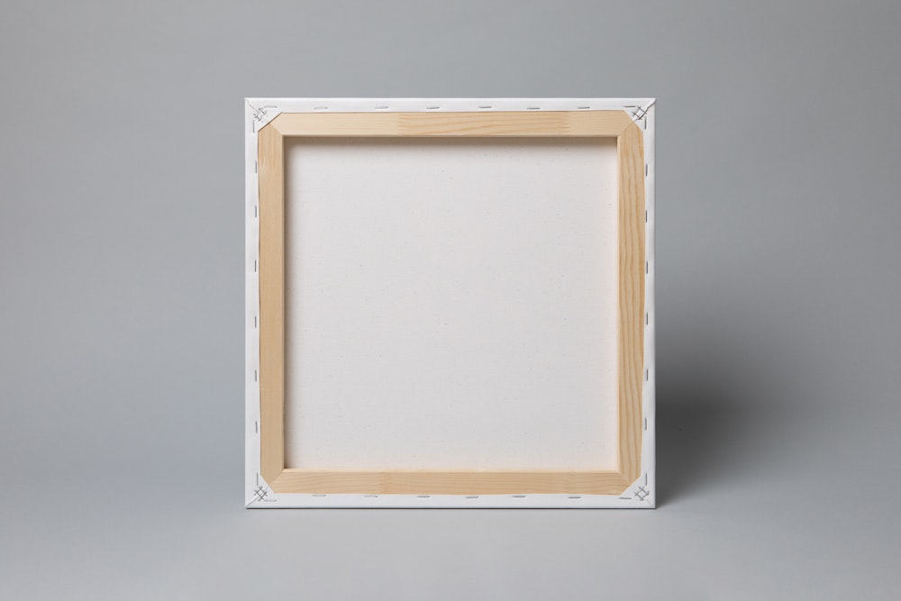 Back of Portrait Canvas print mounted on Stretcher Frame, standing up on gray background