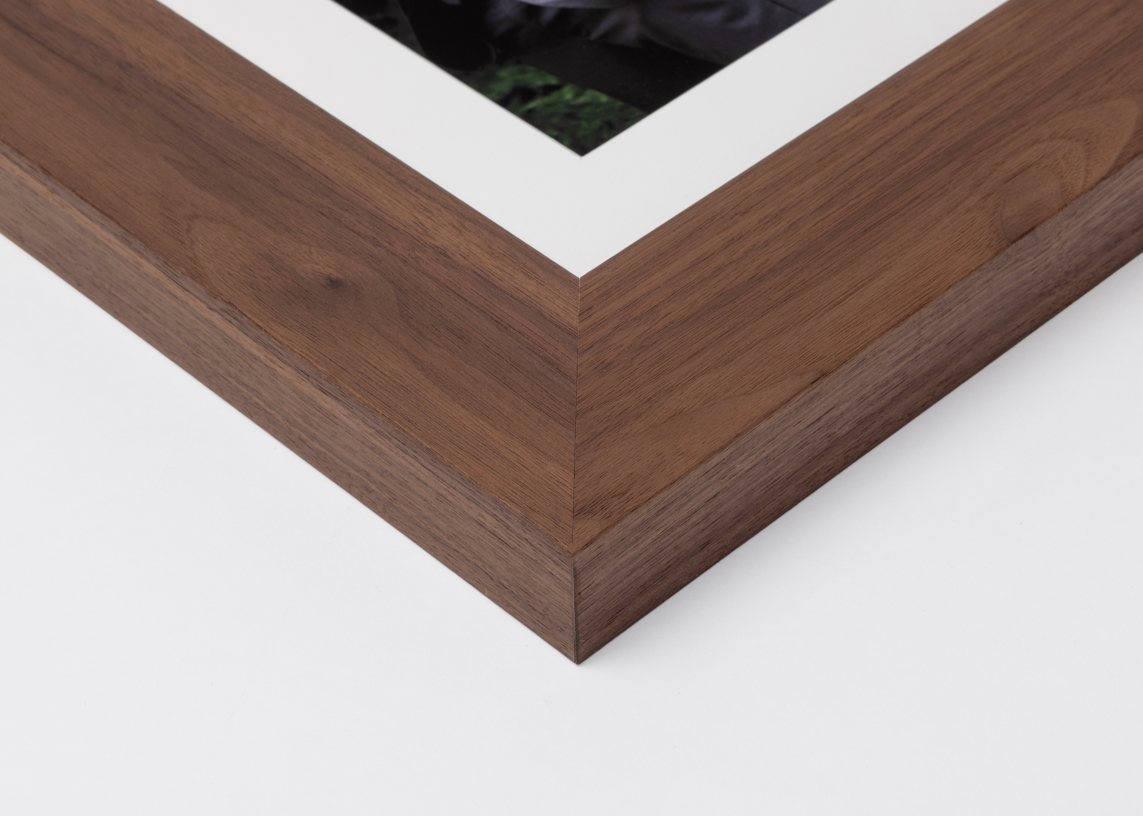 Corner detail of gray Woodland Frame moulding in 2¼" width