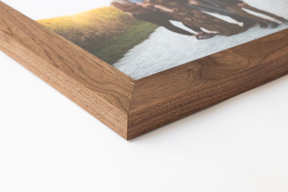 Corner detail of walnut Woodland Frame moulding in 2¼" width