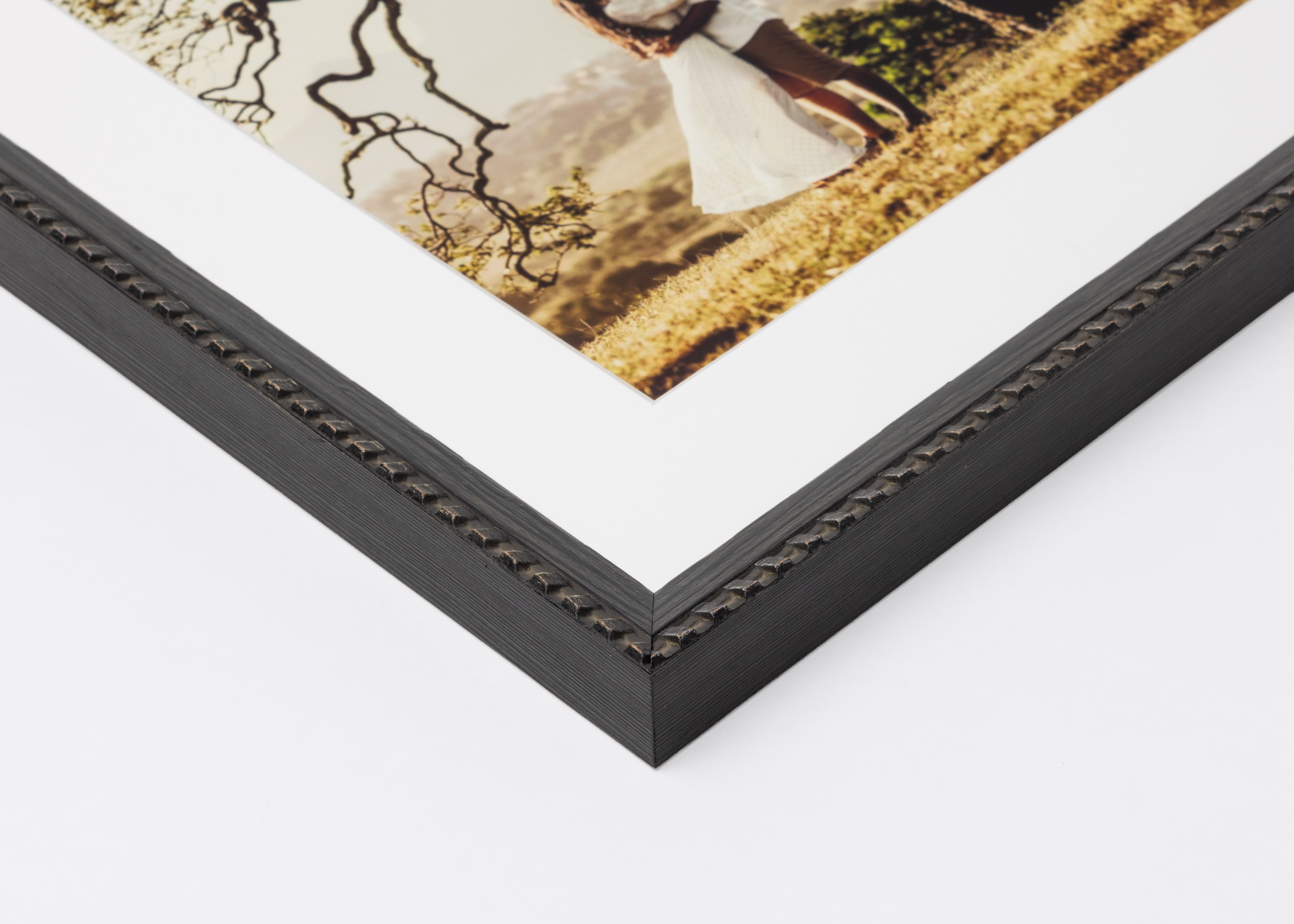 Corner detail of ⅞" Weathered Black Brimfield Frame moulding