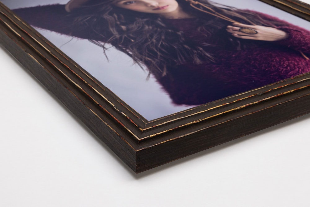 Corner detail of Antique Brown Patina Column Frame moulding