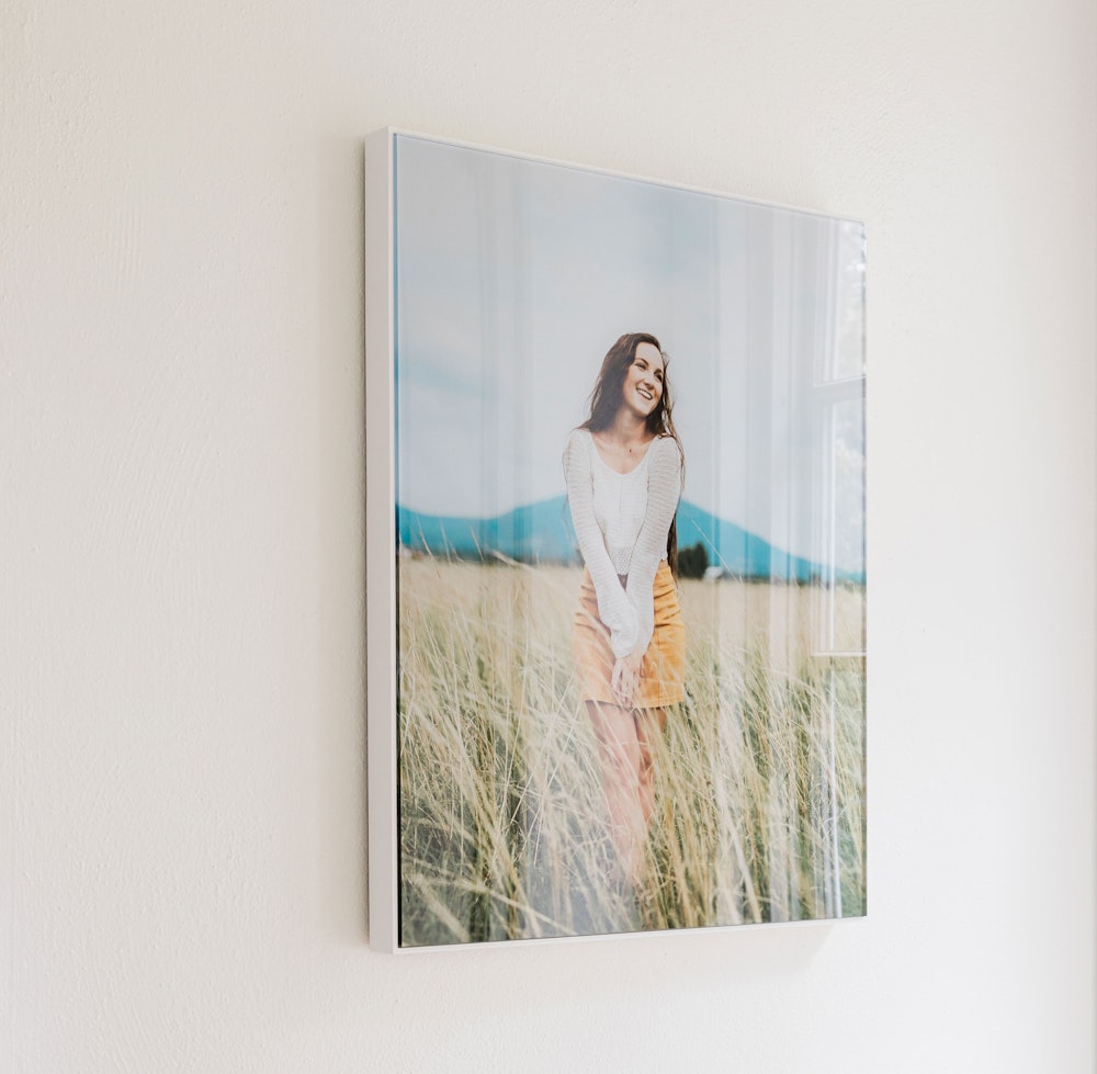 Senior girl portrait in white Framed Acrylic Print hanging on wall