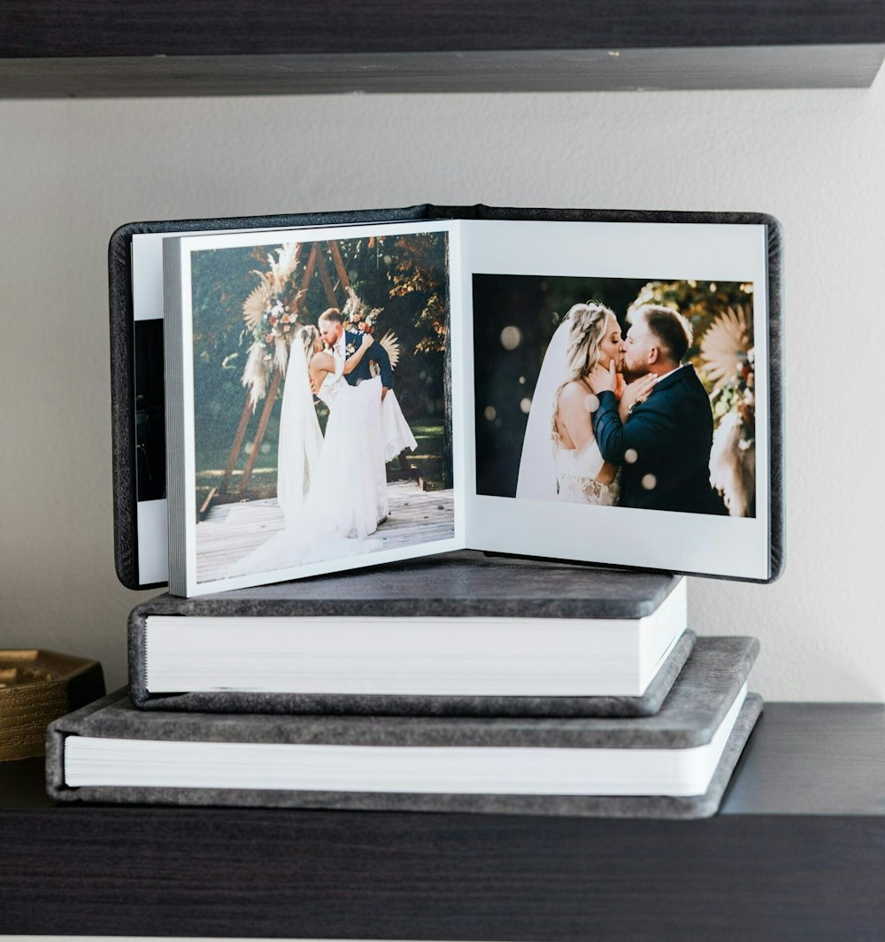 A WHCC Wedding Photo Album shown with designed seamless spreads