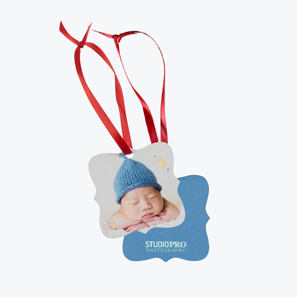 Metal Ornament baby design with ornate E12 shape