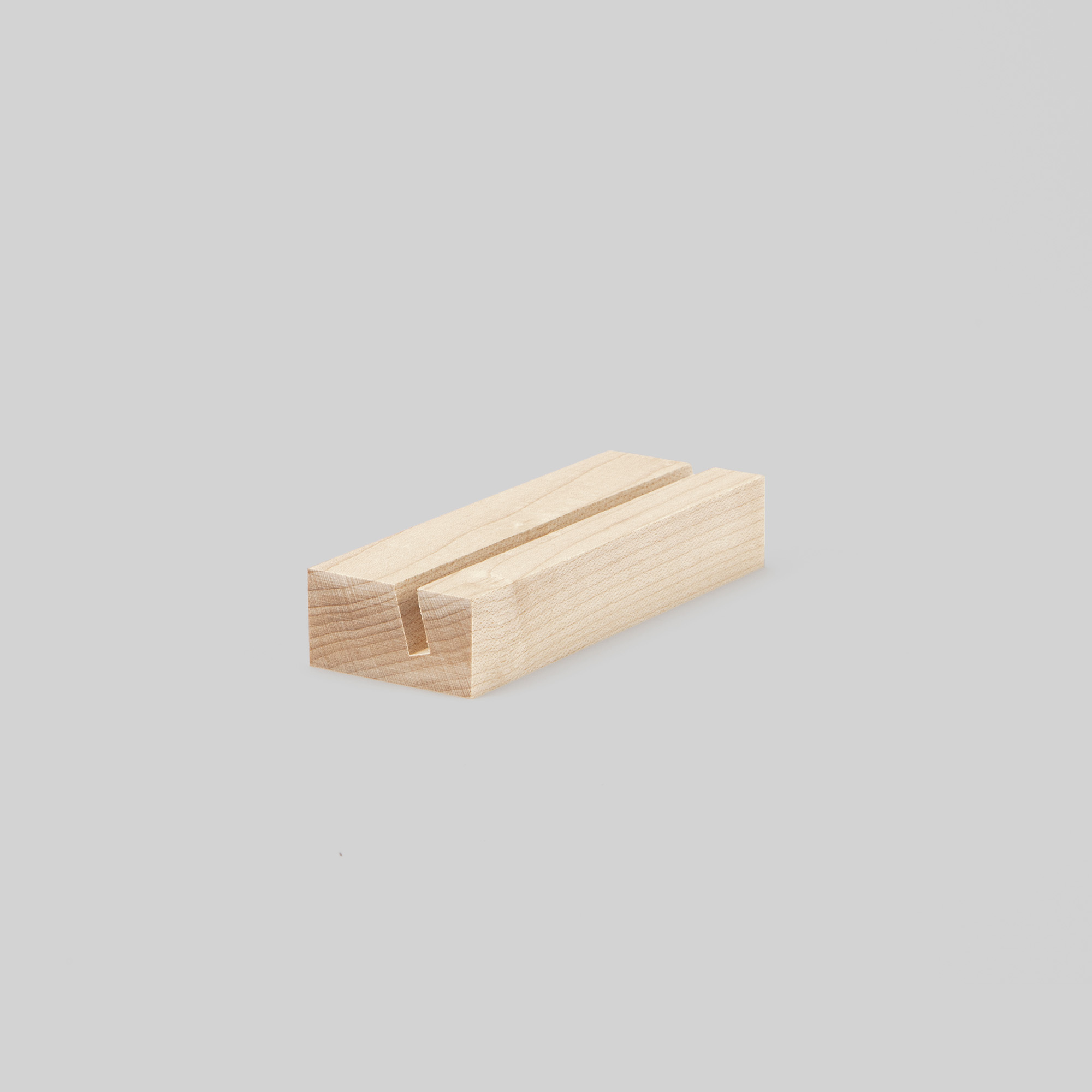 4-inch maple Wood Display Stand at an angle on grey background